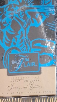 Sealed 1994 Flair Marvel pack with blue Cyclops foil cover